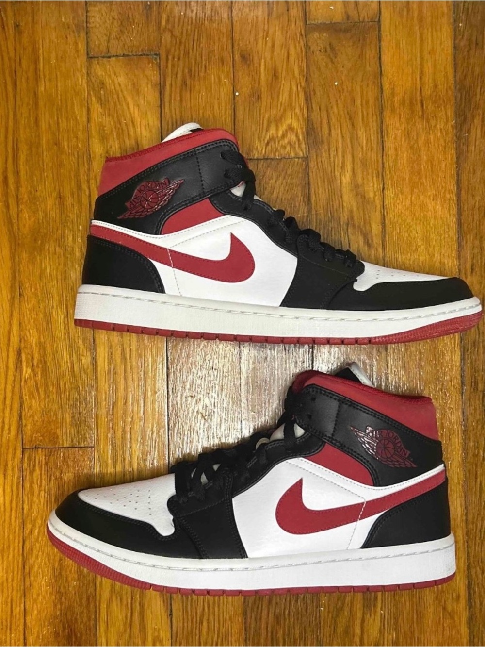 Nike Air Jordan 1 Mid in White, Black & Red